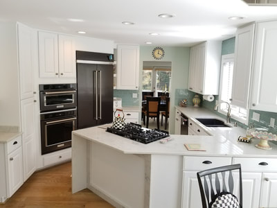 Bright white refinished kitchen cabinets